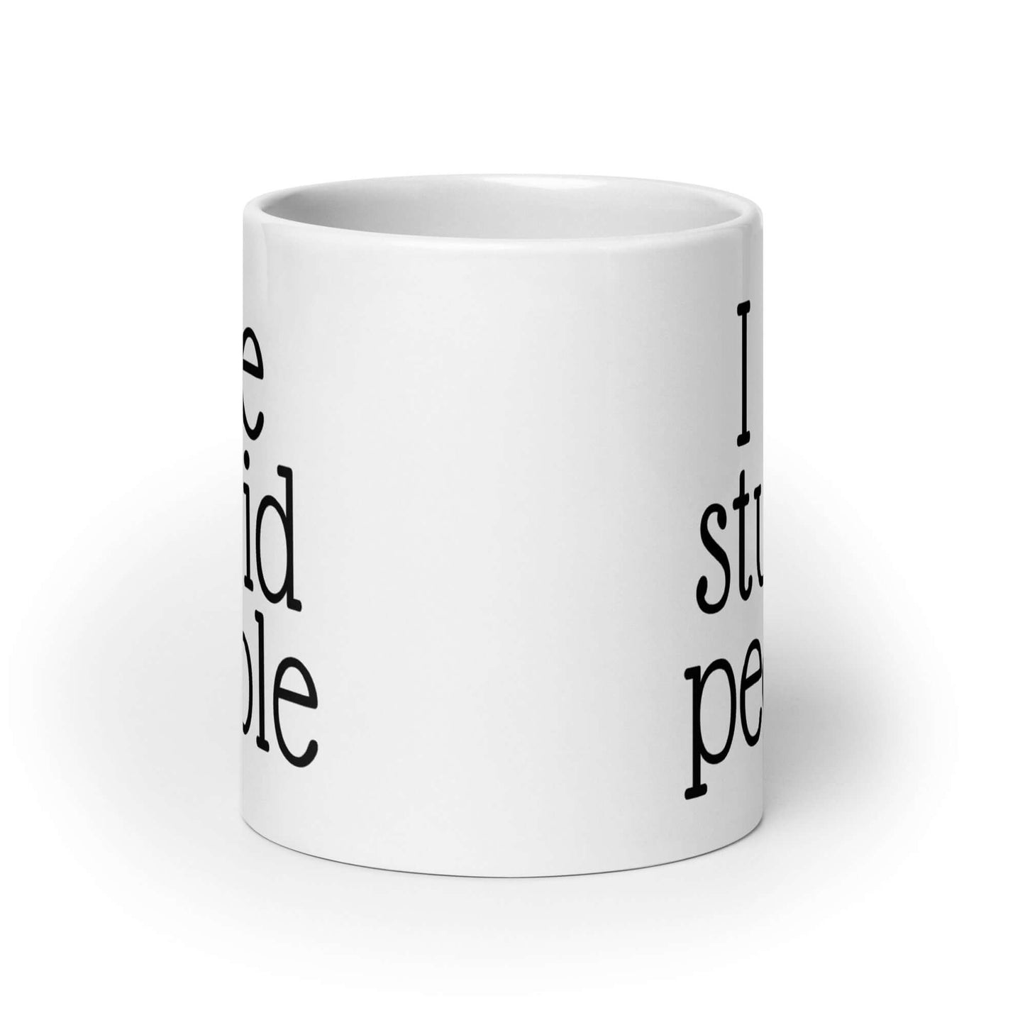 White ceramic mug with the words I see stupid people printed on both sides.
