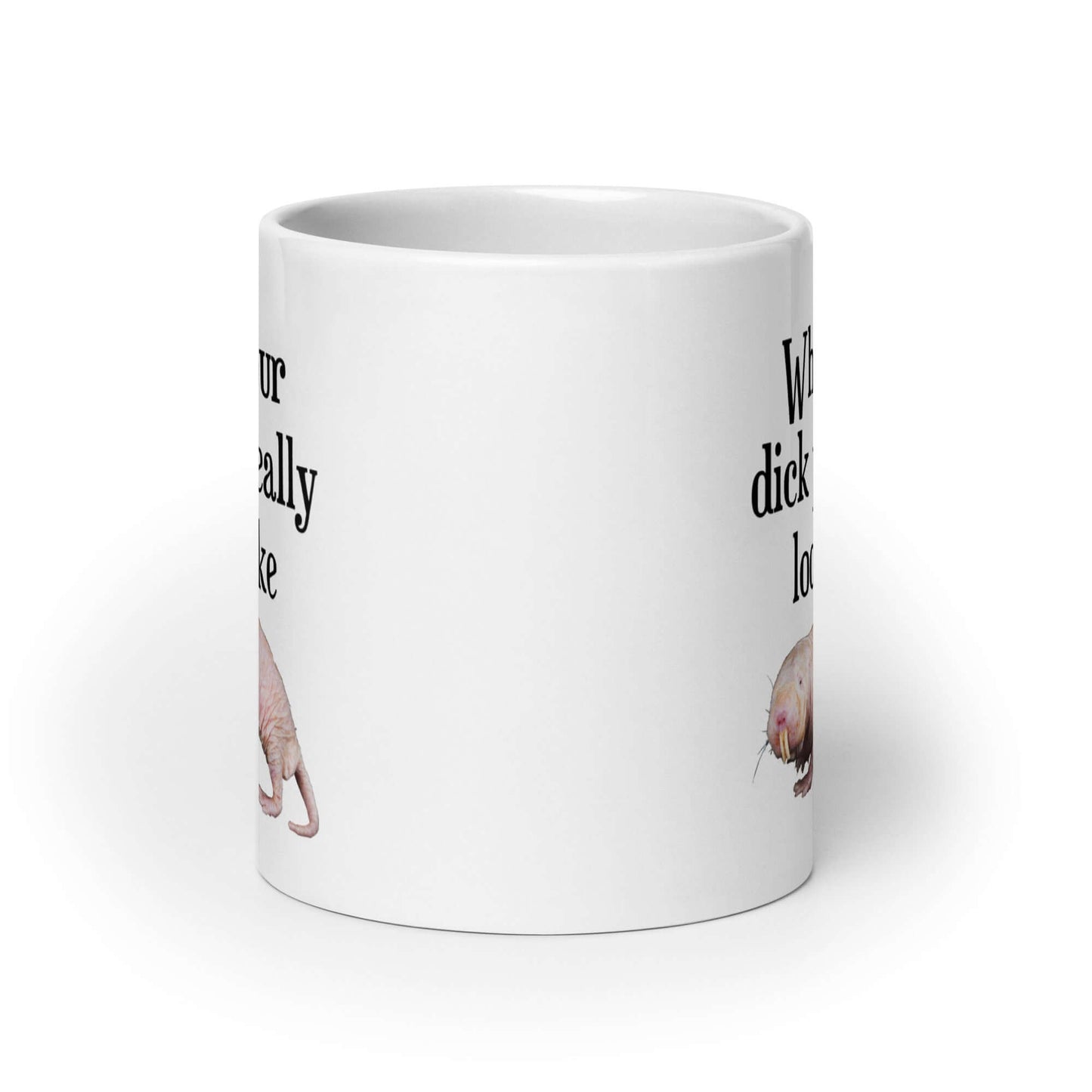 White ceramic coffee mug with the phrase What your dick pic really looks like printed on both sides. There is an image of a naked mole rat underneath with phrase. The graphics are printed on both sides of the mug.