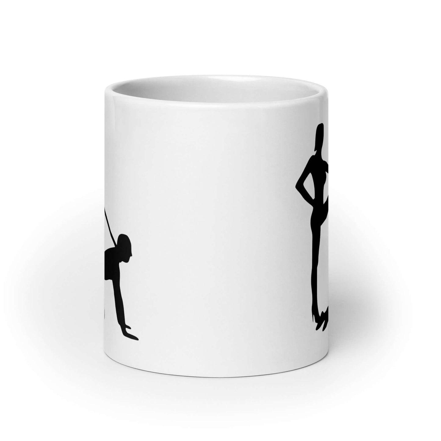 White ceramic coffee mug with the image of a silhouette of a man on his hands and knees and a dominatrix holding his leash printed on both sides.