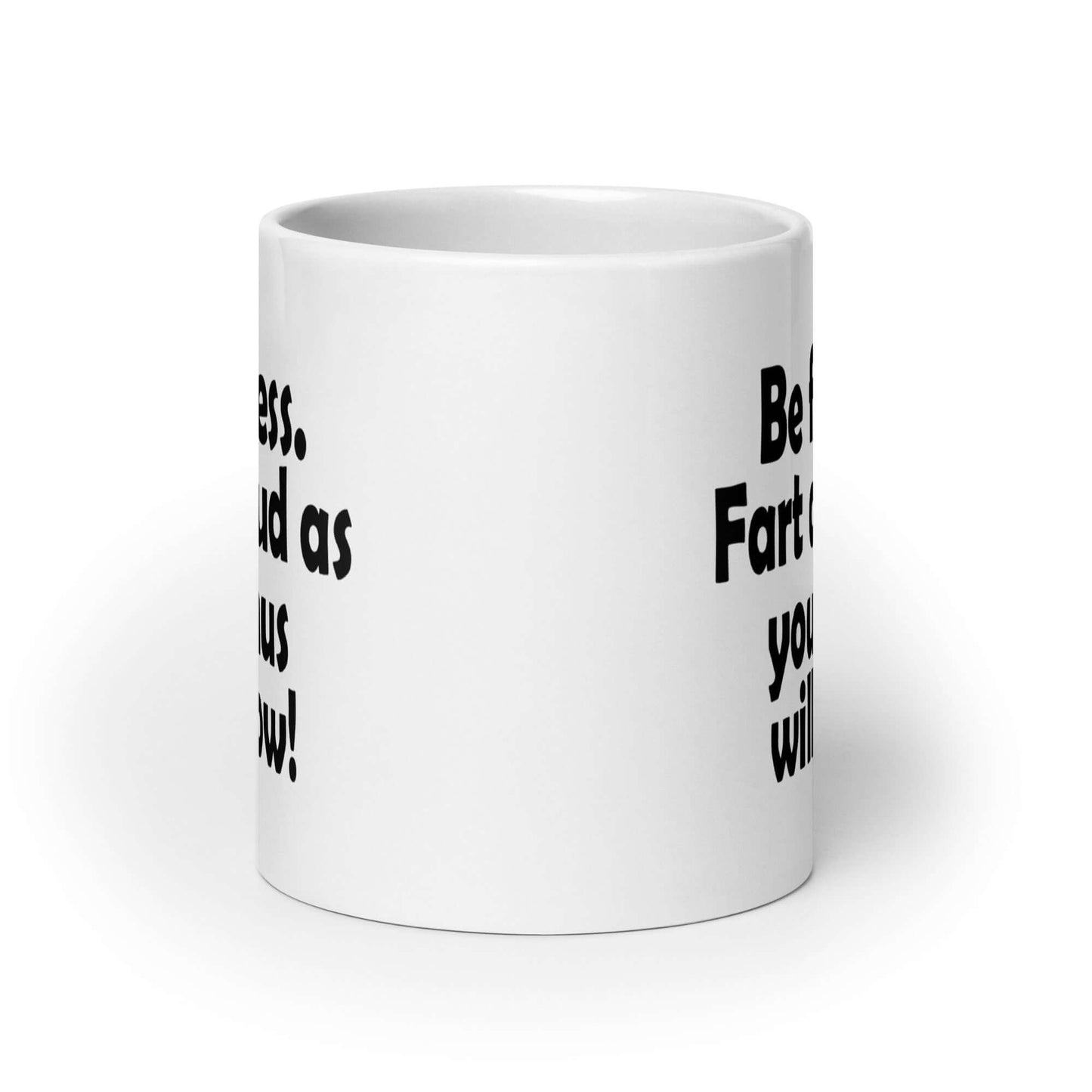 White ceramic coffee mug with the phrase Be fearless. Fart as loud as your anus will allow printed on both sides.