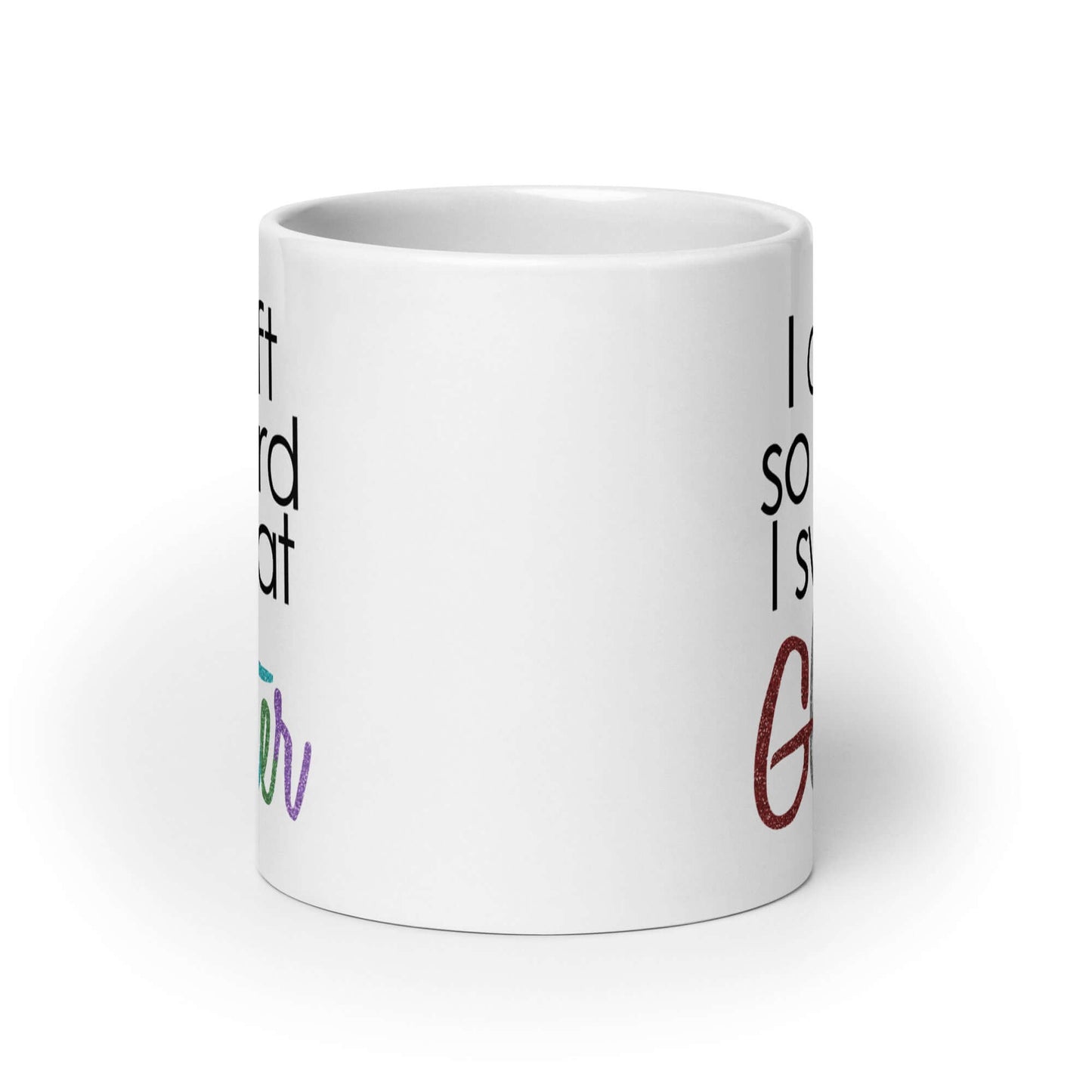 White ceramic coffee mug with the phrase I craft so hard I sweat glitter printed on both sides. The word Glitter is printed in multi colored font that looks like glitter.