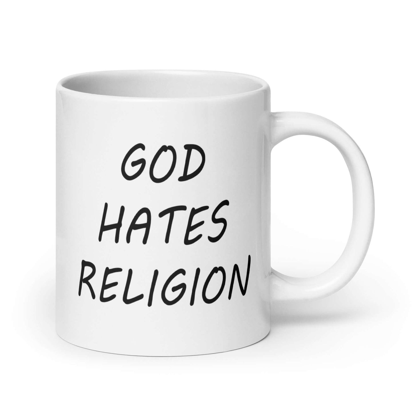 White ceramic mug with with the words God hates religion printed on both sides of the mug.