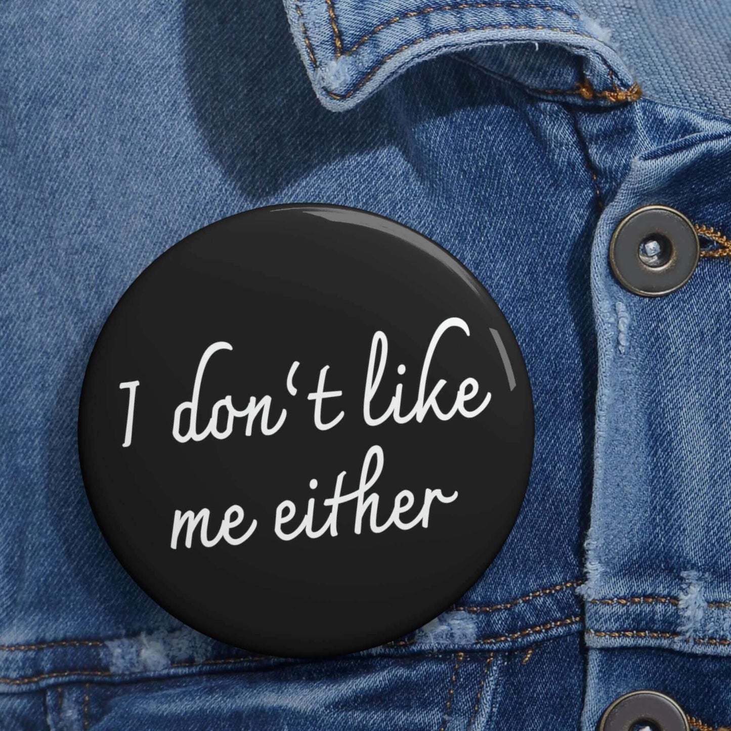 Black pinback button that says I don't like me either.