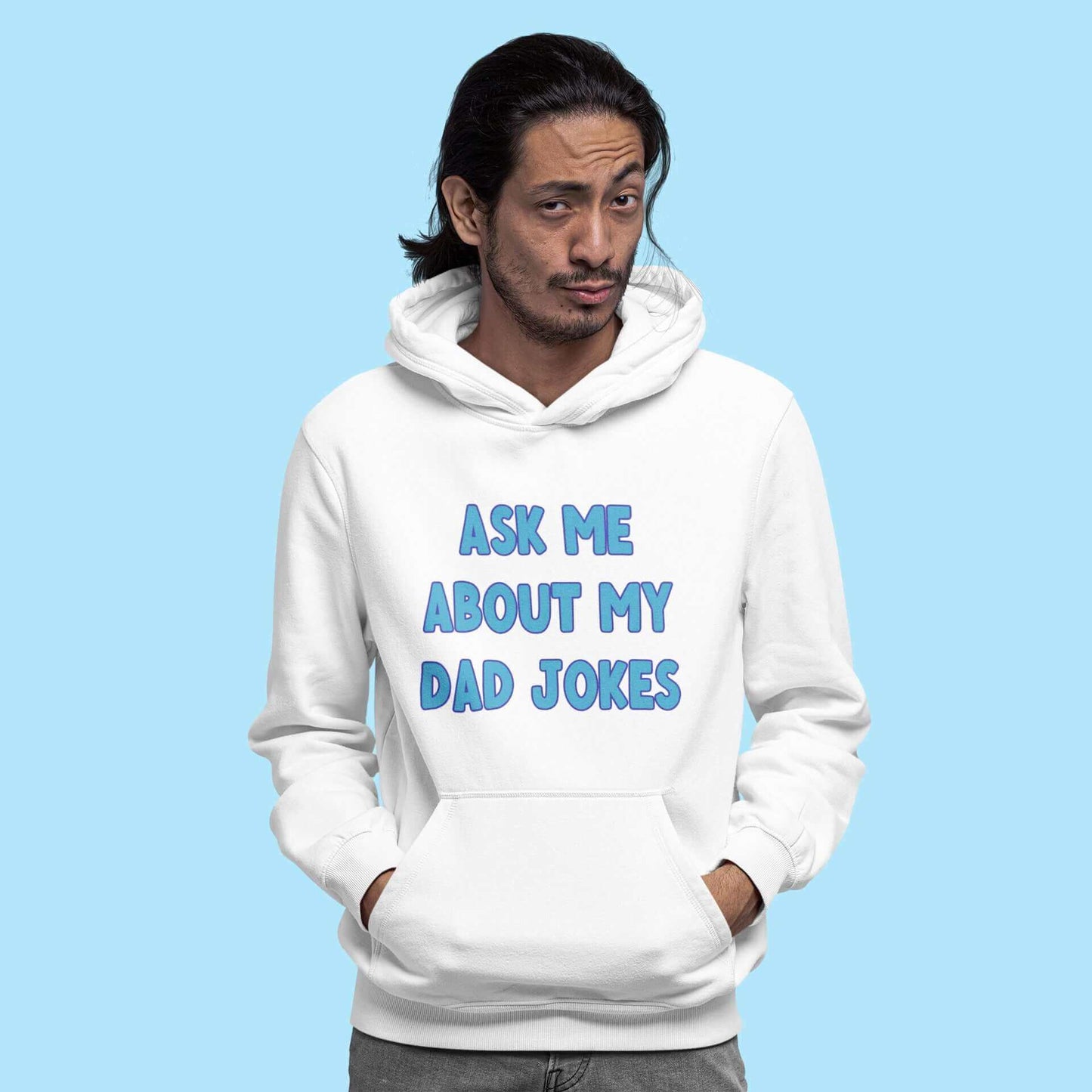 Man wearing white hoodie sweatshirt with the words Ask me about my Dad jokes printed on the front.