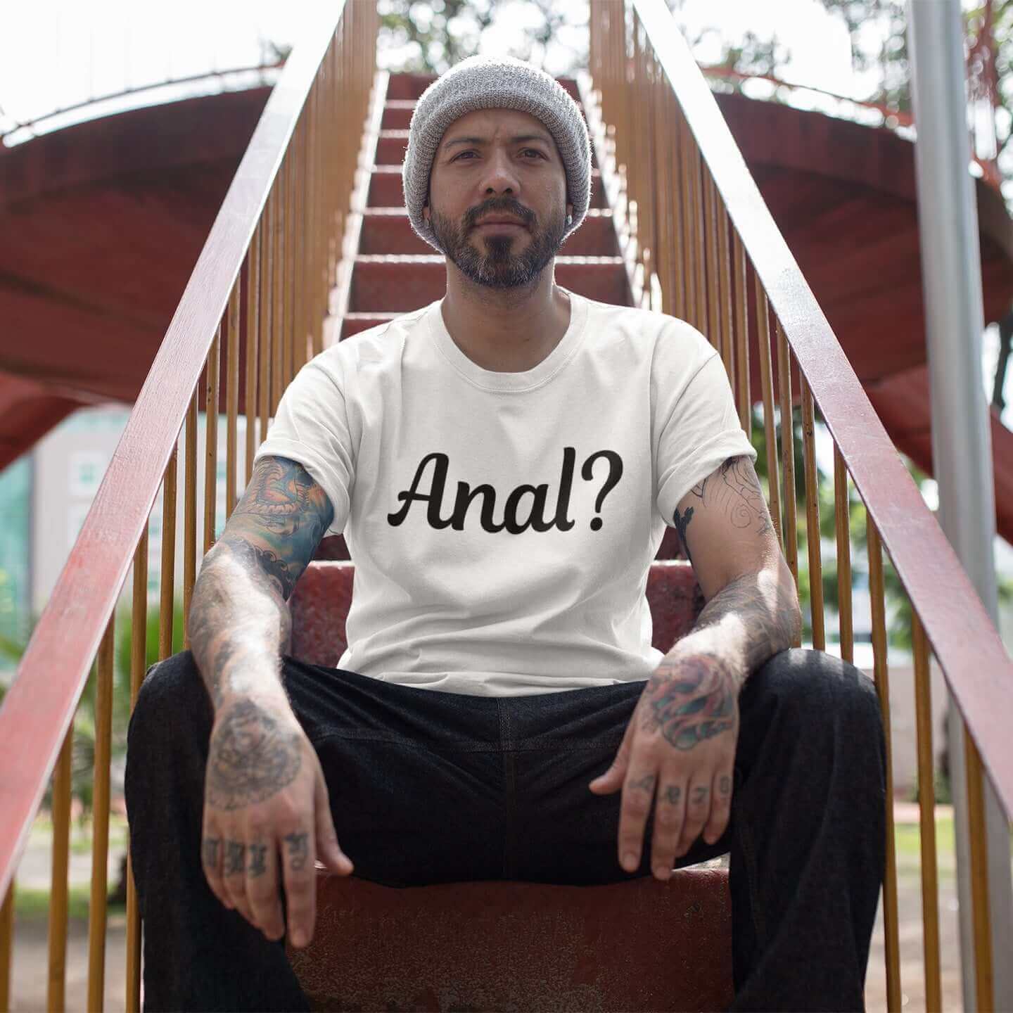 Man wearing white t-shirt with the word Anal with a question mark printed on the front.