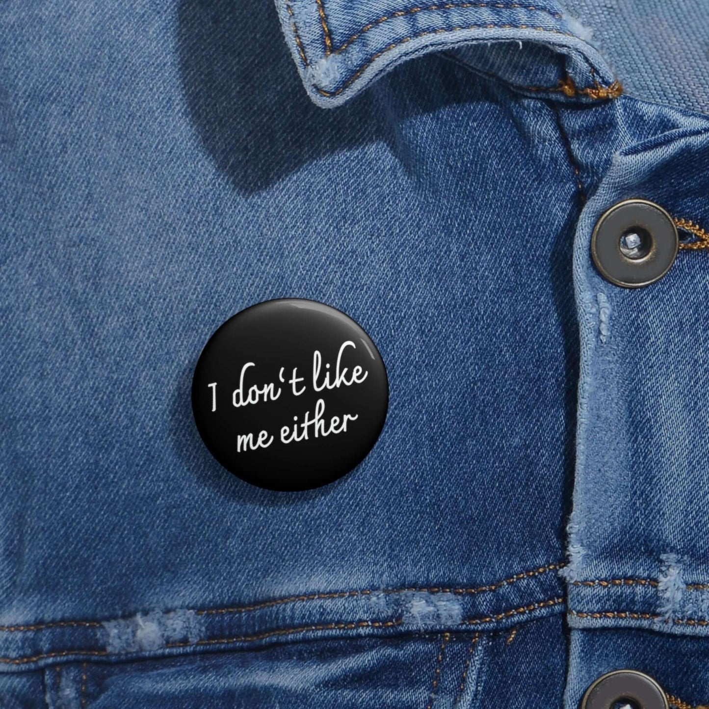 Black pinback button that says I don't like me either.
