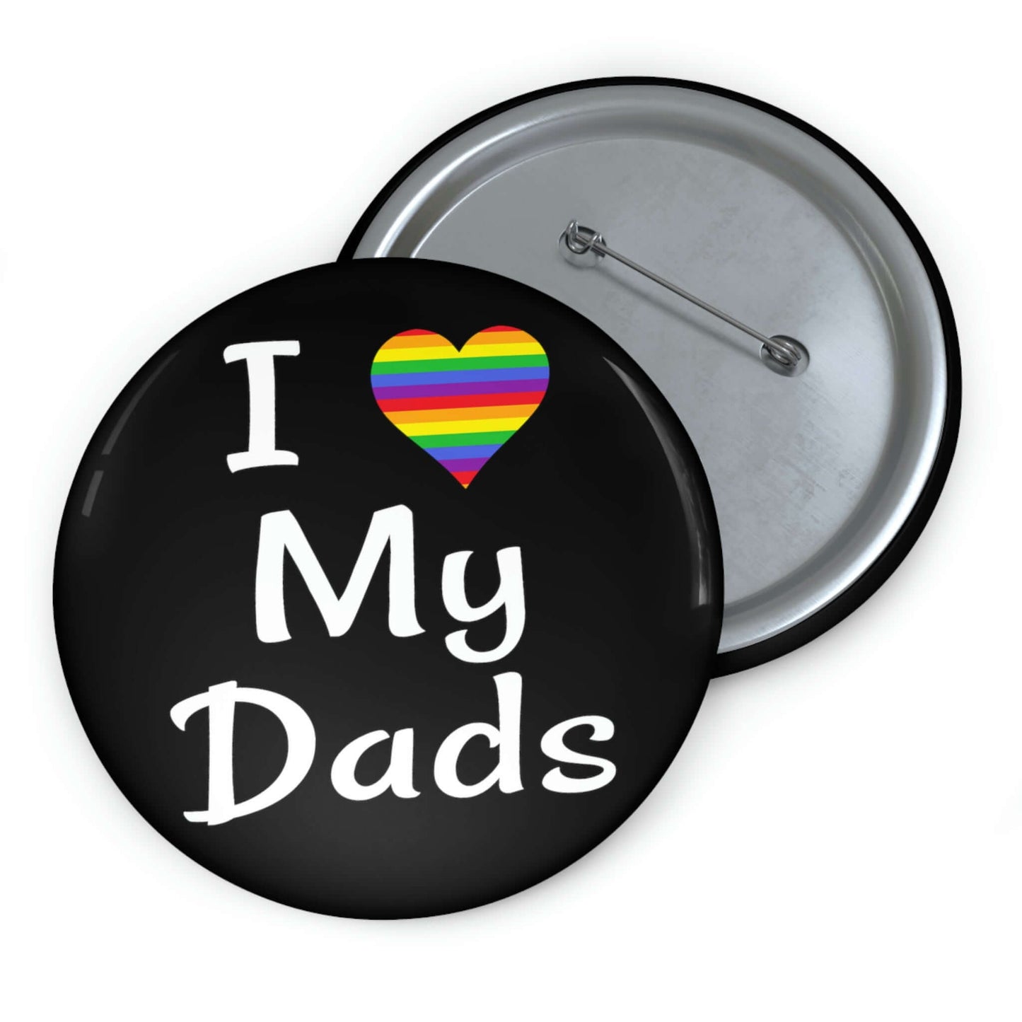 Black pin-back button that says I heart my dads. The heart is rainbow.