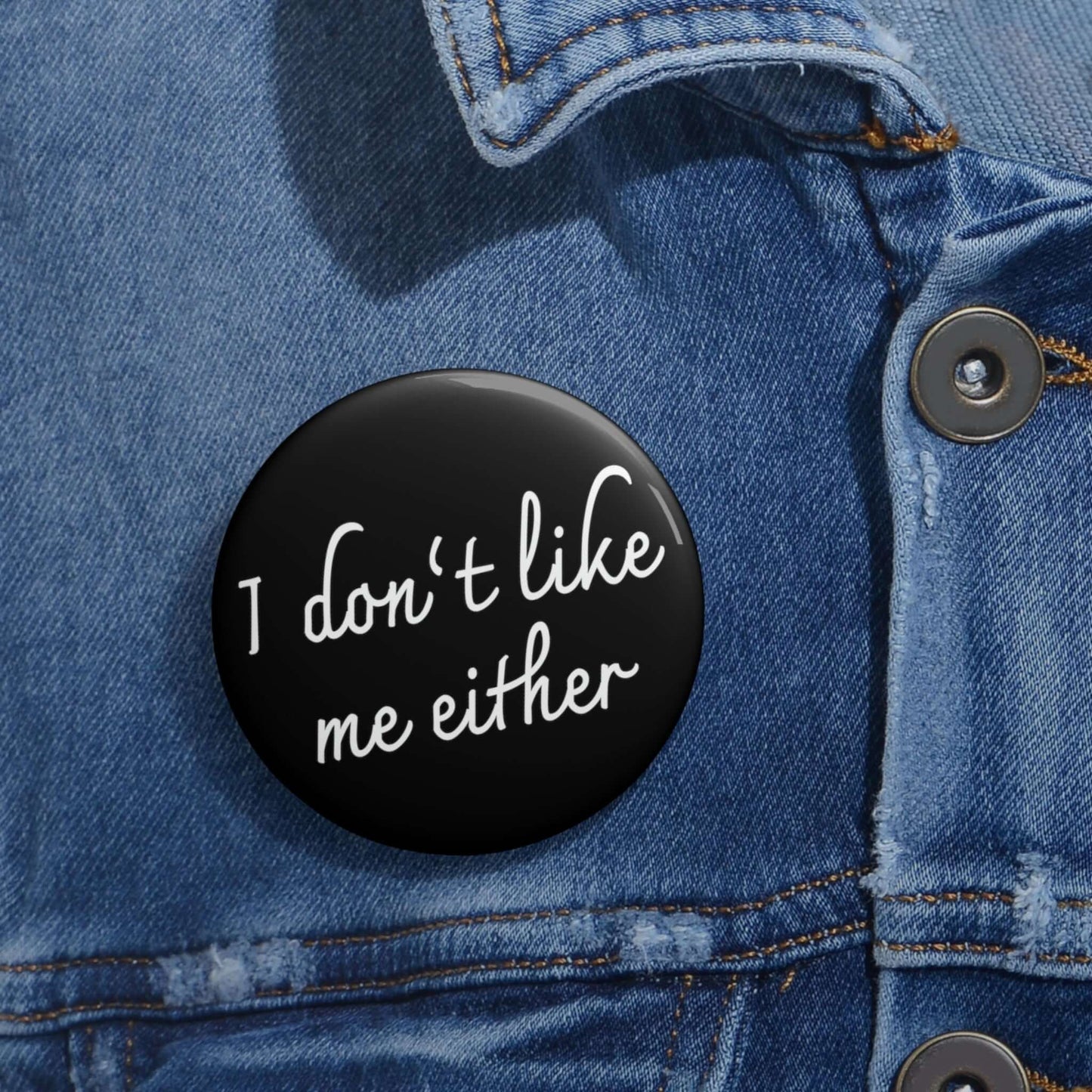 Black pinback button that says I don't like me either.