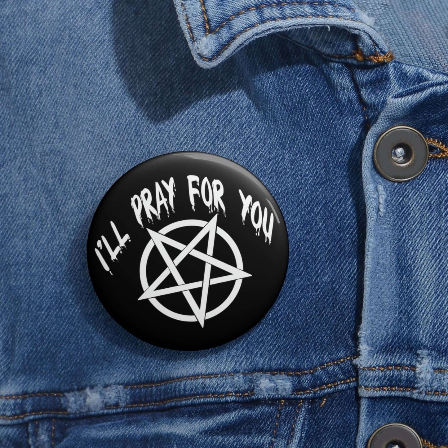 Black pinback button with image of a pentagram and the words I'll pray for you.