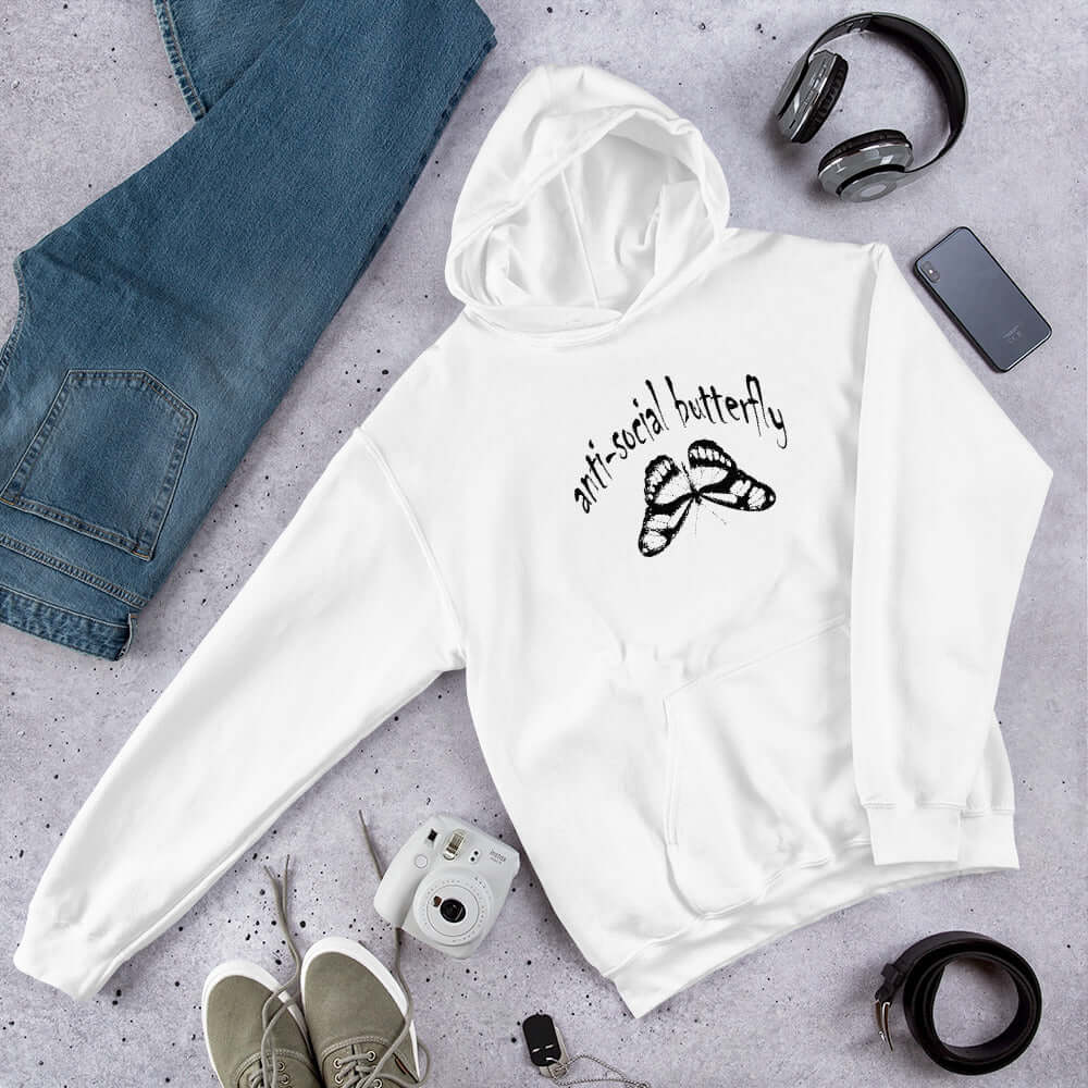 White hoodie sweatshirt with an image of an upside down butterfly and the words Anti-social butterfly printed on the front.