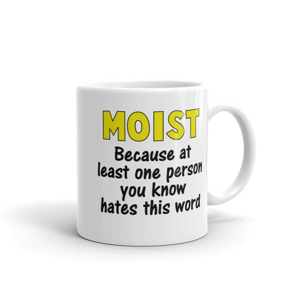 White ceramic coffee mug with the word Moist printed in large yellow bold font. In smaller font under the word moist is the phrase Because at least one person you know hates this word. The text is printed on both sides of the mug.