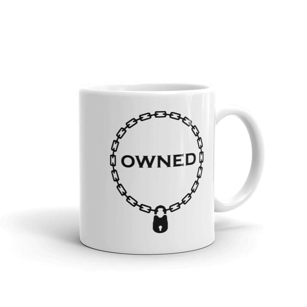 White ceramic coffee mug with an image of a BDSM chain collar with a lock and the word Owned printed in the center of the collar. The design is printed on both sides of the mug.