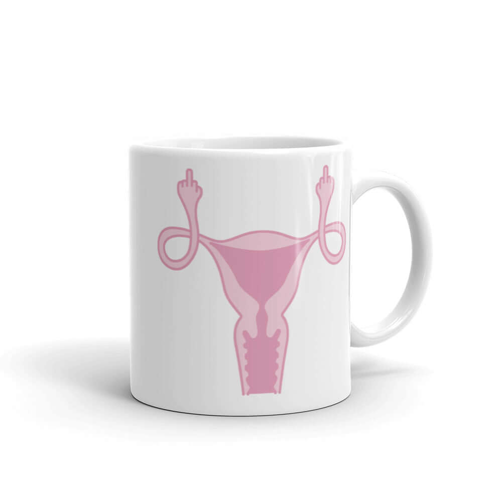 11 ounce white ceramic mug with image of a pink uterus flipping middle finger graphic printed on both sides.