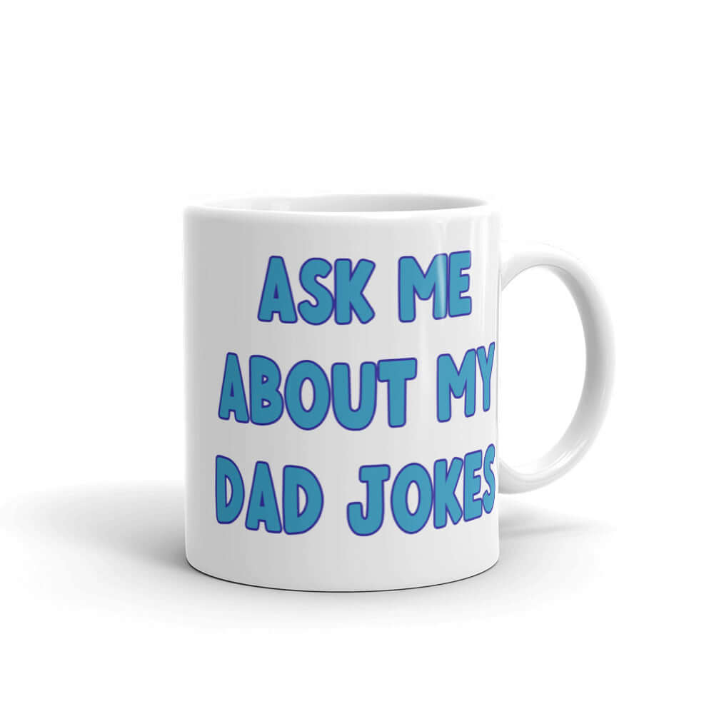 White ceramic coffee mug with the words Ask me about my Dad jokes printed on both sides.