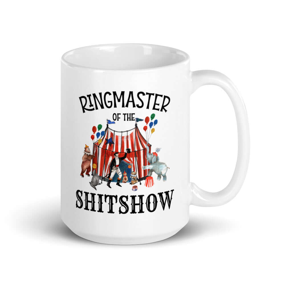 White ceramic coffee mug with a circus theme graphic and the words Ringmaster of the Shitshow printed on both sides.
