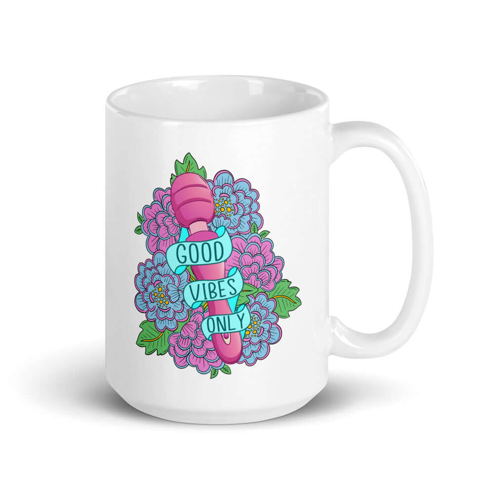 White ceramic coffee mug with graphic that has the words Good vibes only layered over a pink wand vibrator with flowers around. The graphic design is printed on both sides of the mug.
