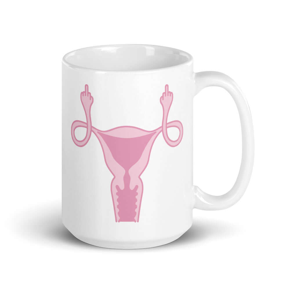 15 ounce white ceramic mug with image of a pink uterus flipping middle finger graphic printed on both sides.