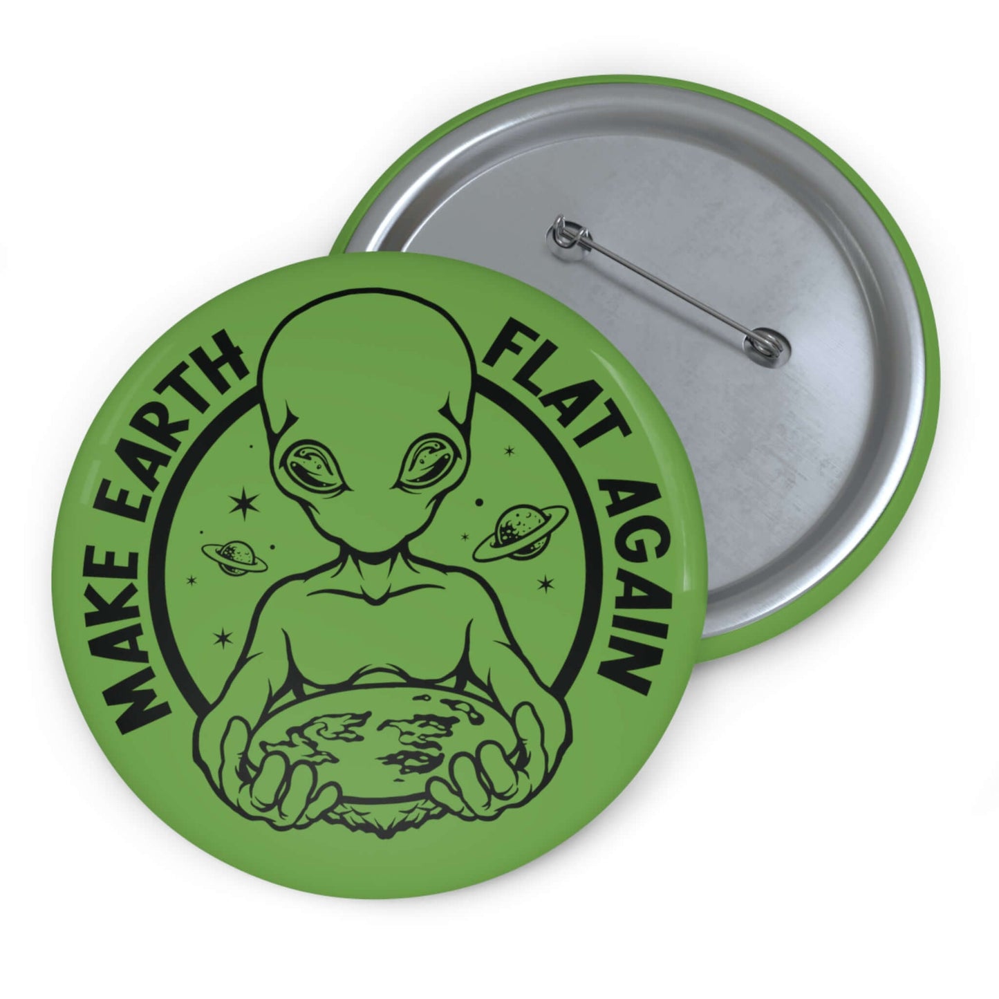 Green pinback button with an image of an alien holding flat earth and the words Make earth flat again.