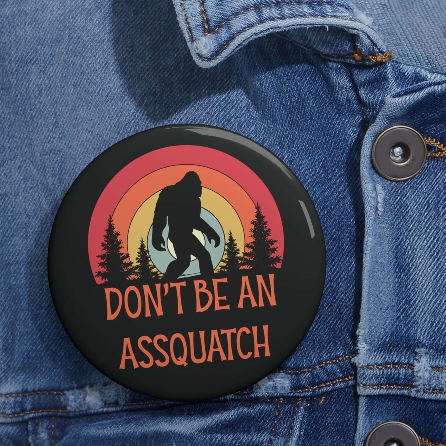 Pinback button with image of a sasquatch and text that says Don't be an assquatch.