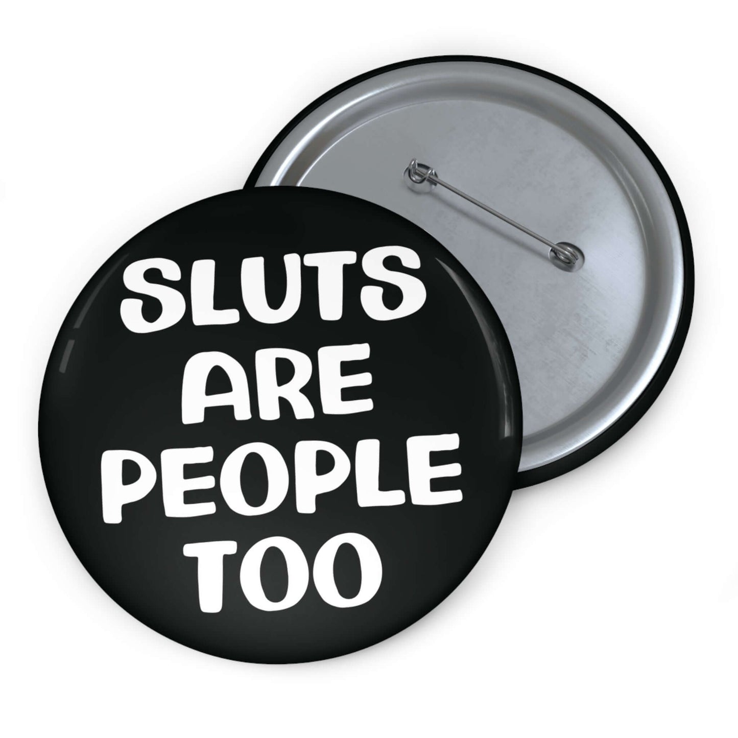 Black pinback button that says Sluts are people too.