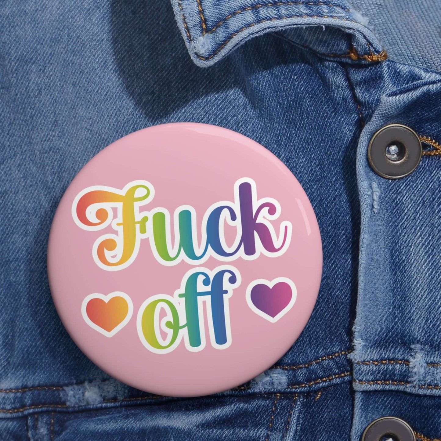 Fuck off rainbow font 80's style pinback button with pink background.