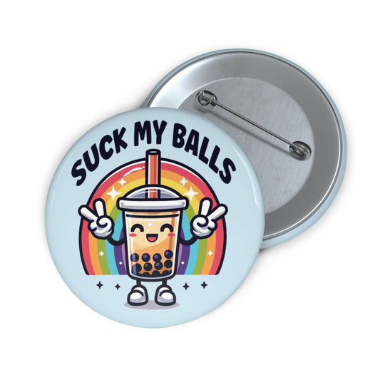 Light blue pinback button with with graphics of a rainbow and a smiling boba bubble tea drink. The bubble tea has arms and legs. The phrase Suck my balls is printed above the rainbow.