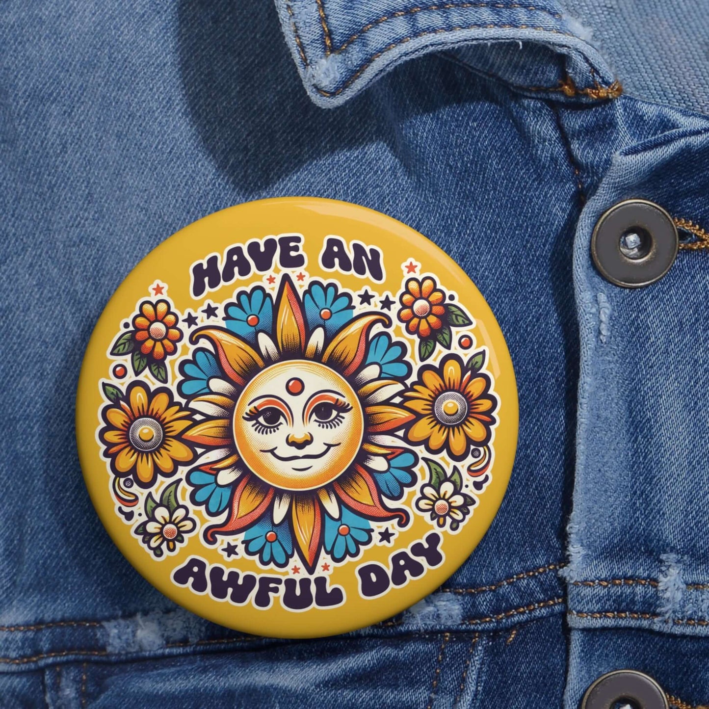 Yellow pinback button with a sun graphic and the phrase Have an awful day.