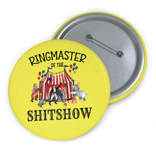 Yellow pinback button with circus graphics and the phrase Ringmaster of the Shitshow.