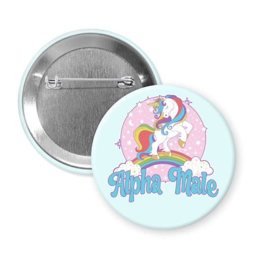 Button badge with unicorn design and 'Alpha Male' text on a light blue background