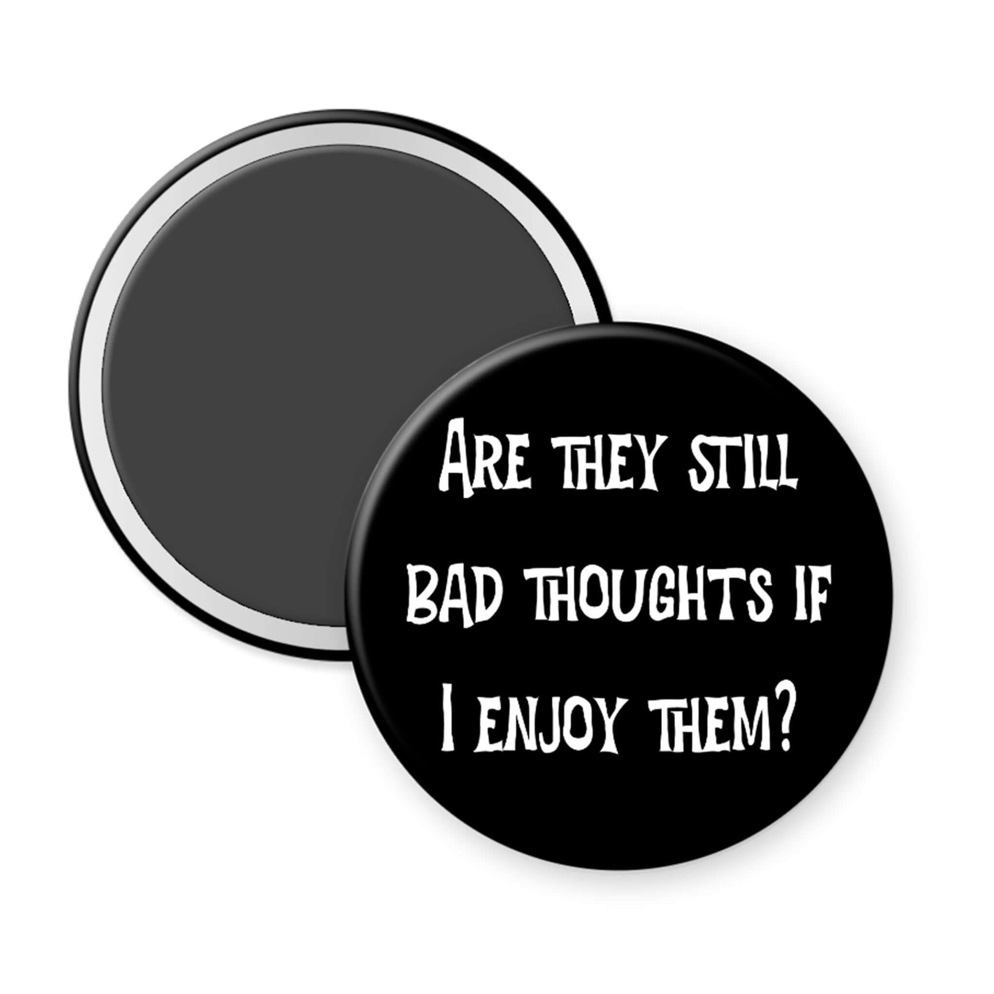 Round black magnet with white text on a white background