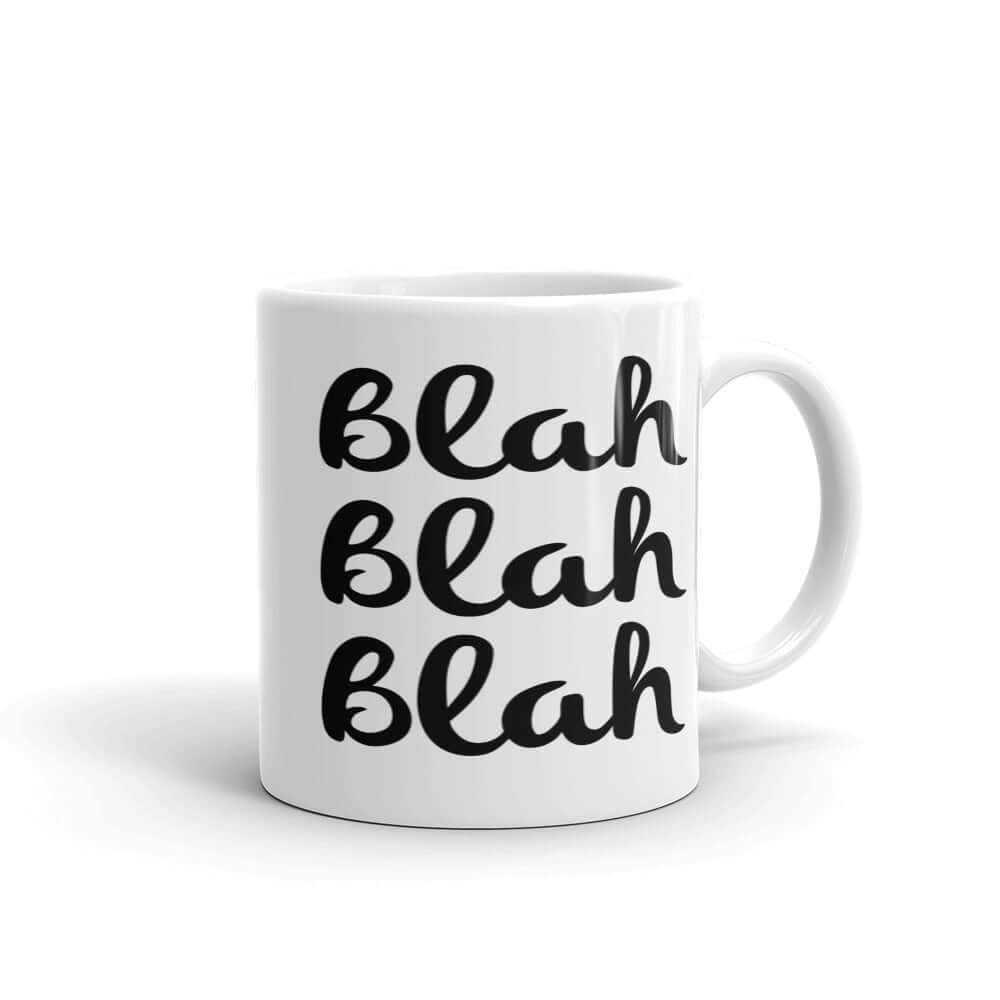 White ceramic coffee mug with the words Blah Blah Blah printed on both sides.