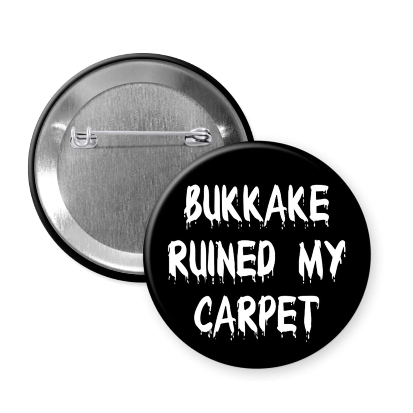 Black pinback button that says Bukkake ruined my carpet.