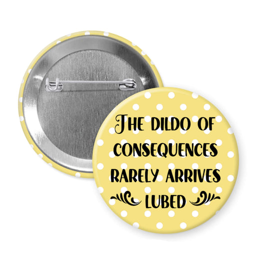 Button badge with yellow polka dot background and black text on a white background