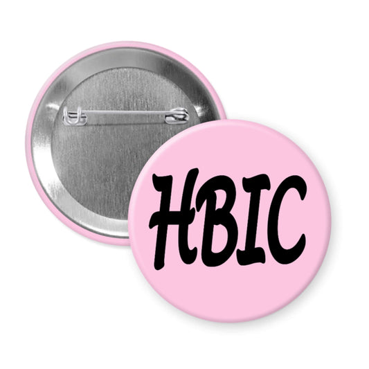 Pink button with 'HBIC' text on a white background