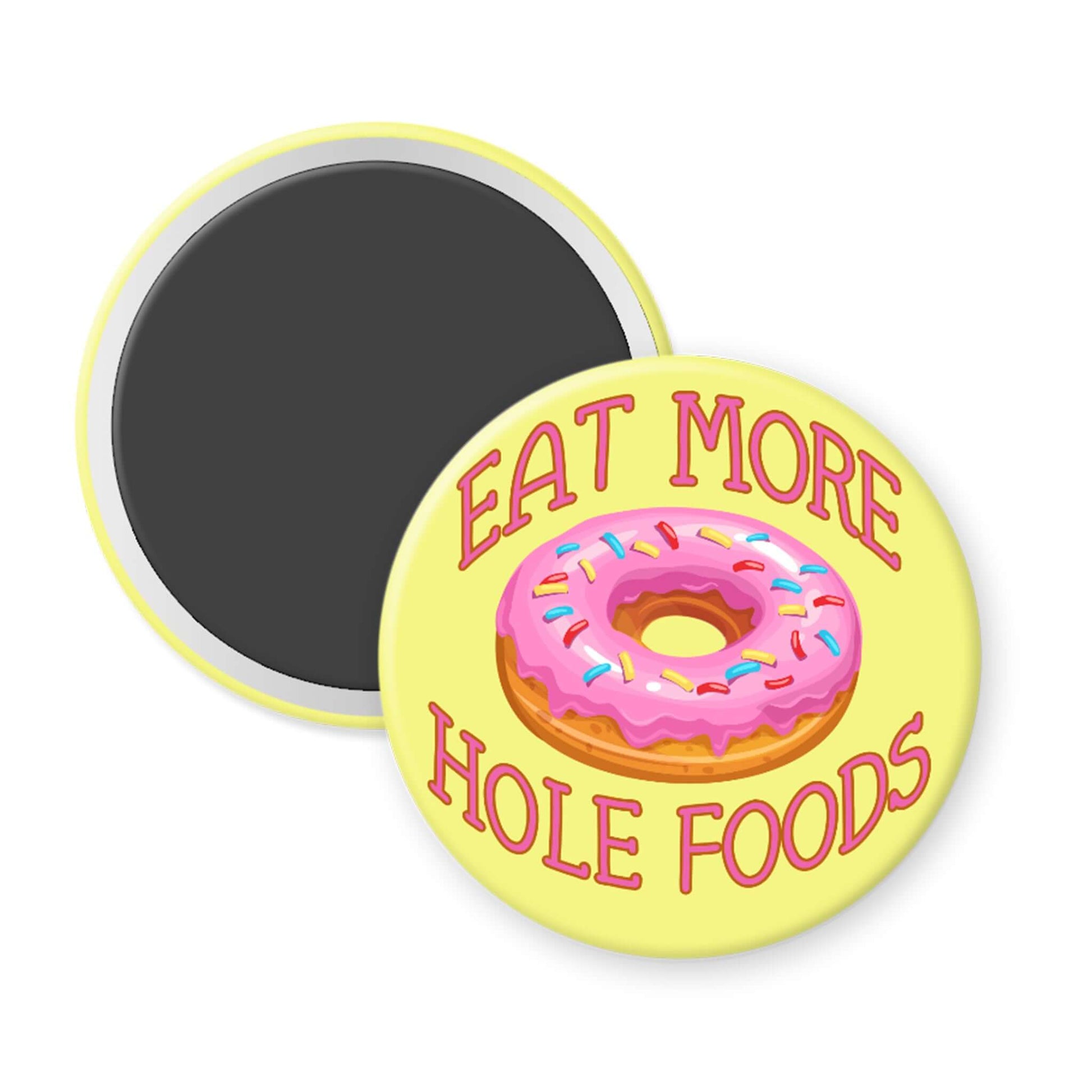 Circular magnet with a donut illustration and text 'Eat More Hole Foods' on a yellow background