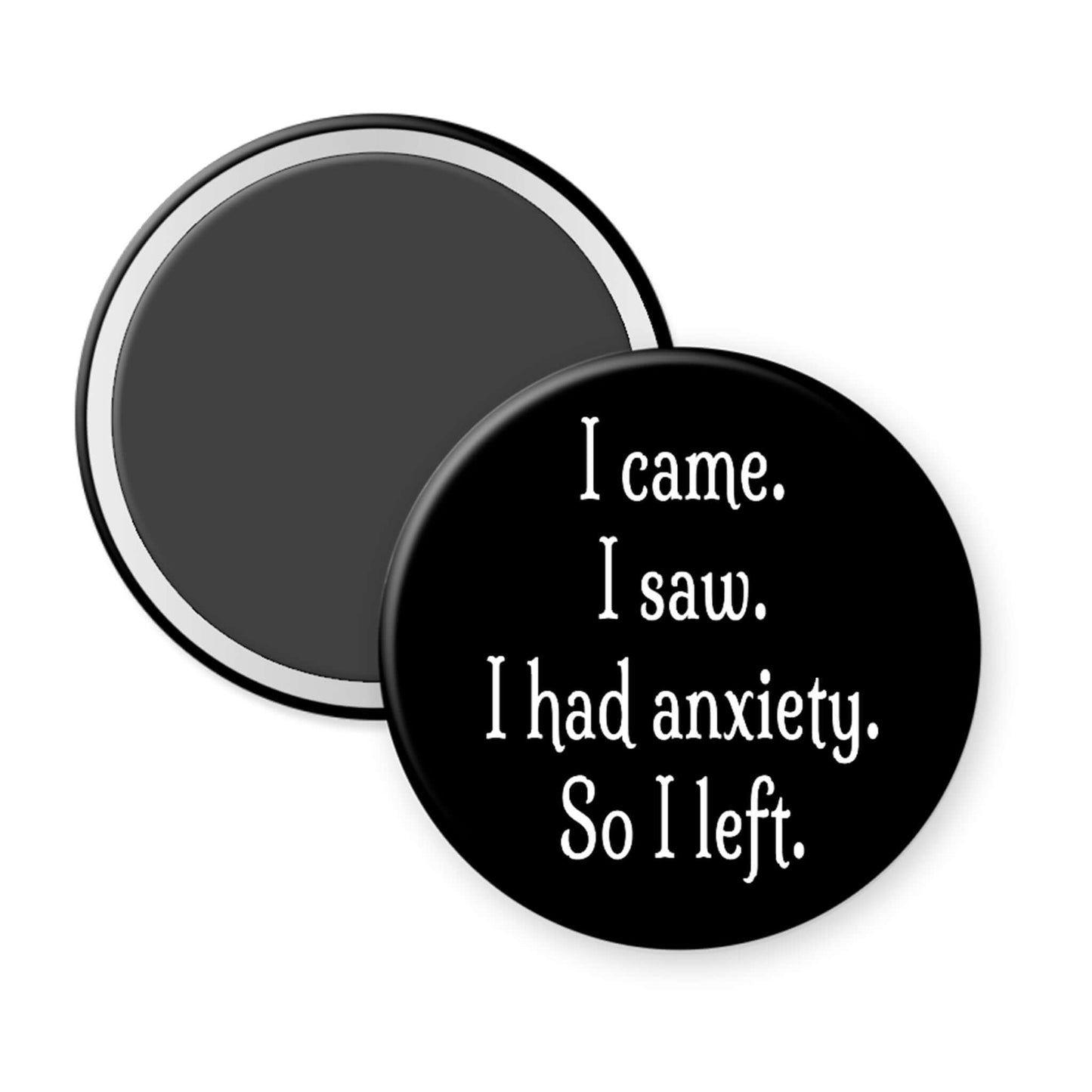 Round black magnet with white text on a white background