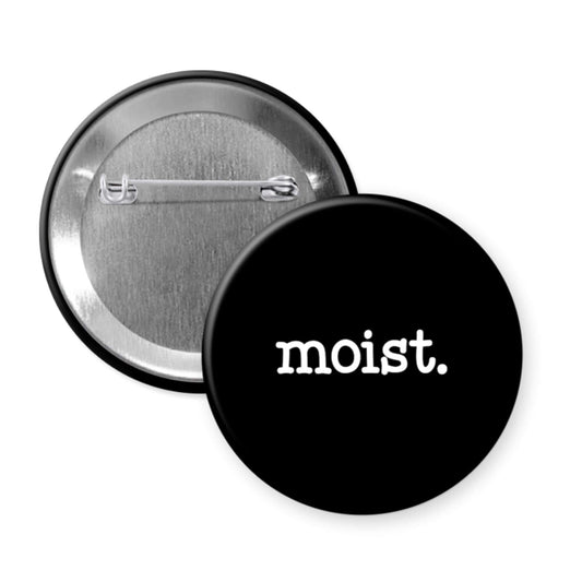 Black button with 'moist.' text on a white background.