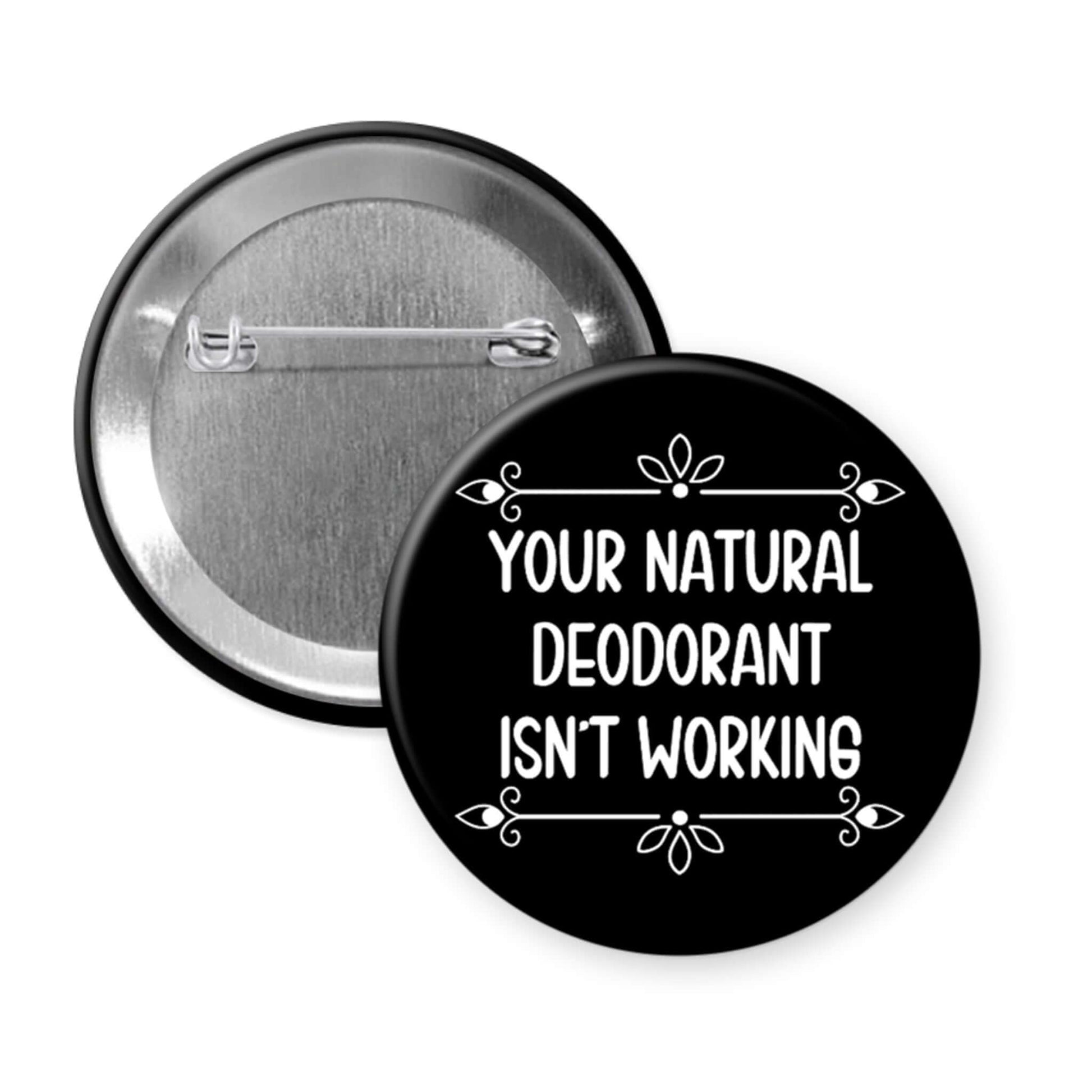 Button badge with 'Your natural deodorant isn't working' text on a black background