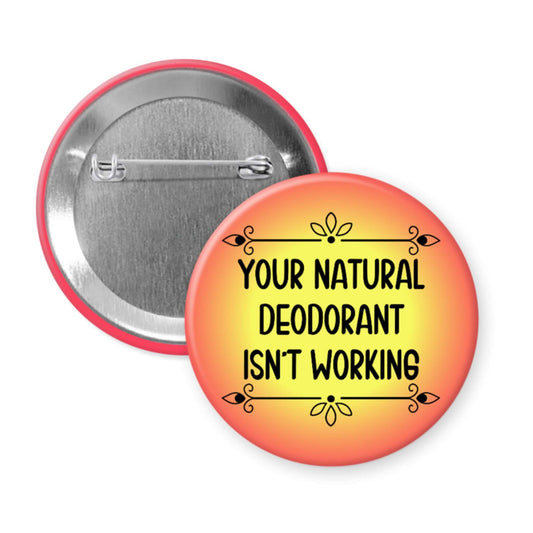 Button badge with 'Your natural deodorant isn't working' text on an orange gradient background
