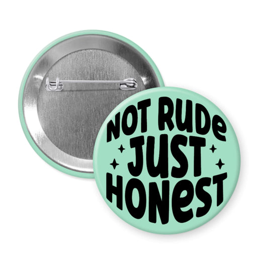 Button badge with 'Not Rude Just Honest' text on a light green background