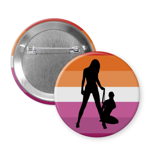 Button badge with silhouette design on a lesbian pride flag background