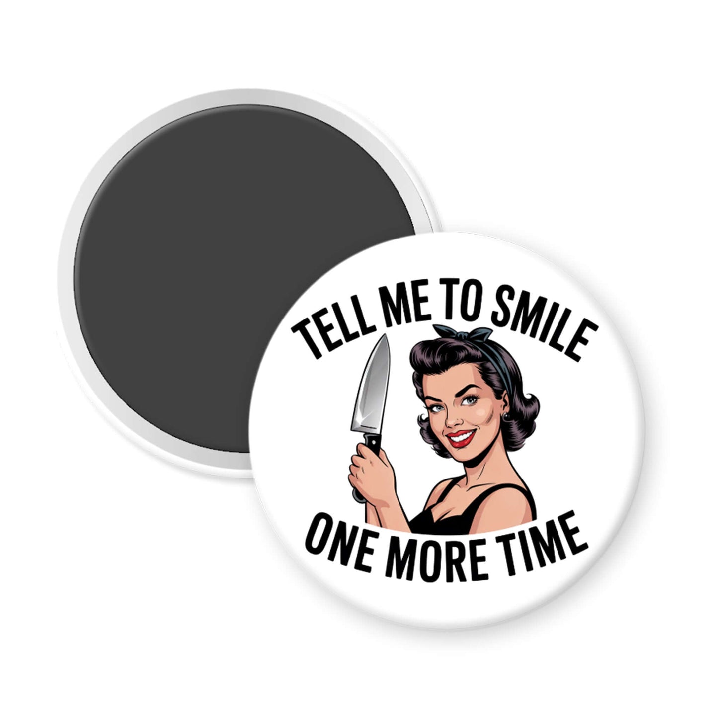 White round magnet with image of a woman holding a knife and the phrase "Tell me to smile one more time"