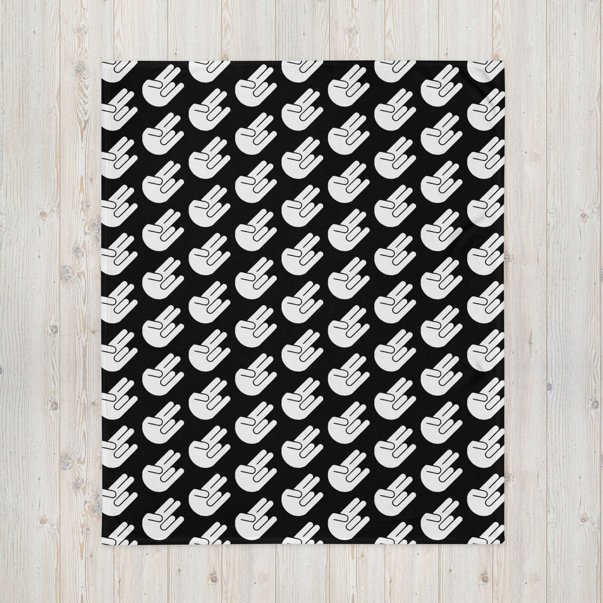 Black fleece throw blanket with image of The Shocker printed all over.