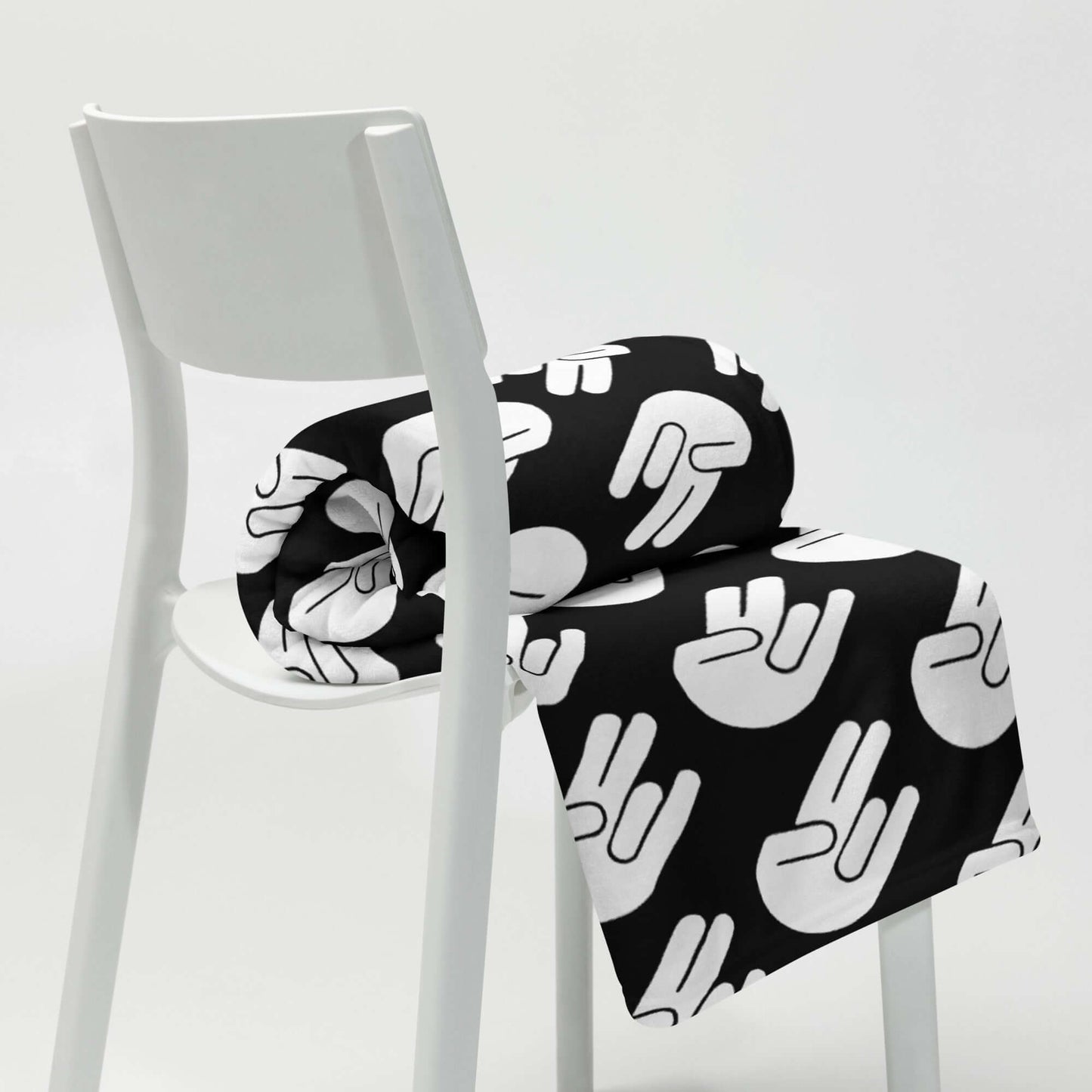 Black fleece throw blanket with image of The Shocker printed all over.