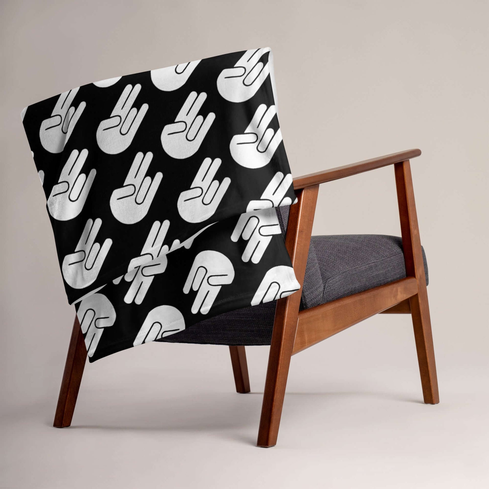 Black fleece throw blanket with image of The Shocker printed all over.