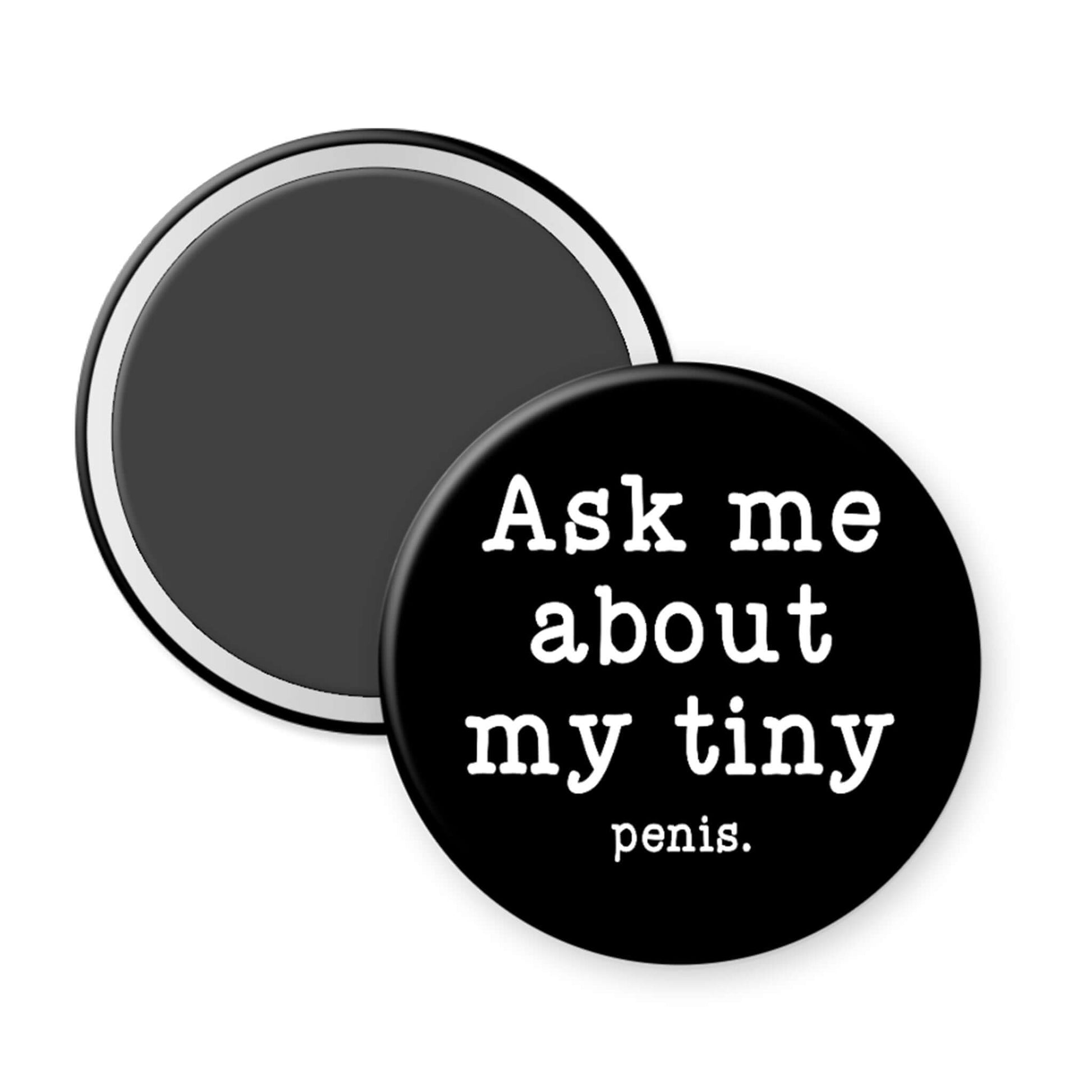 Round black magnet with white text 'Ask me about my tiny penis' on a white background