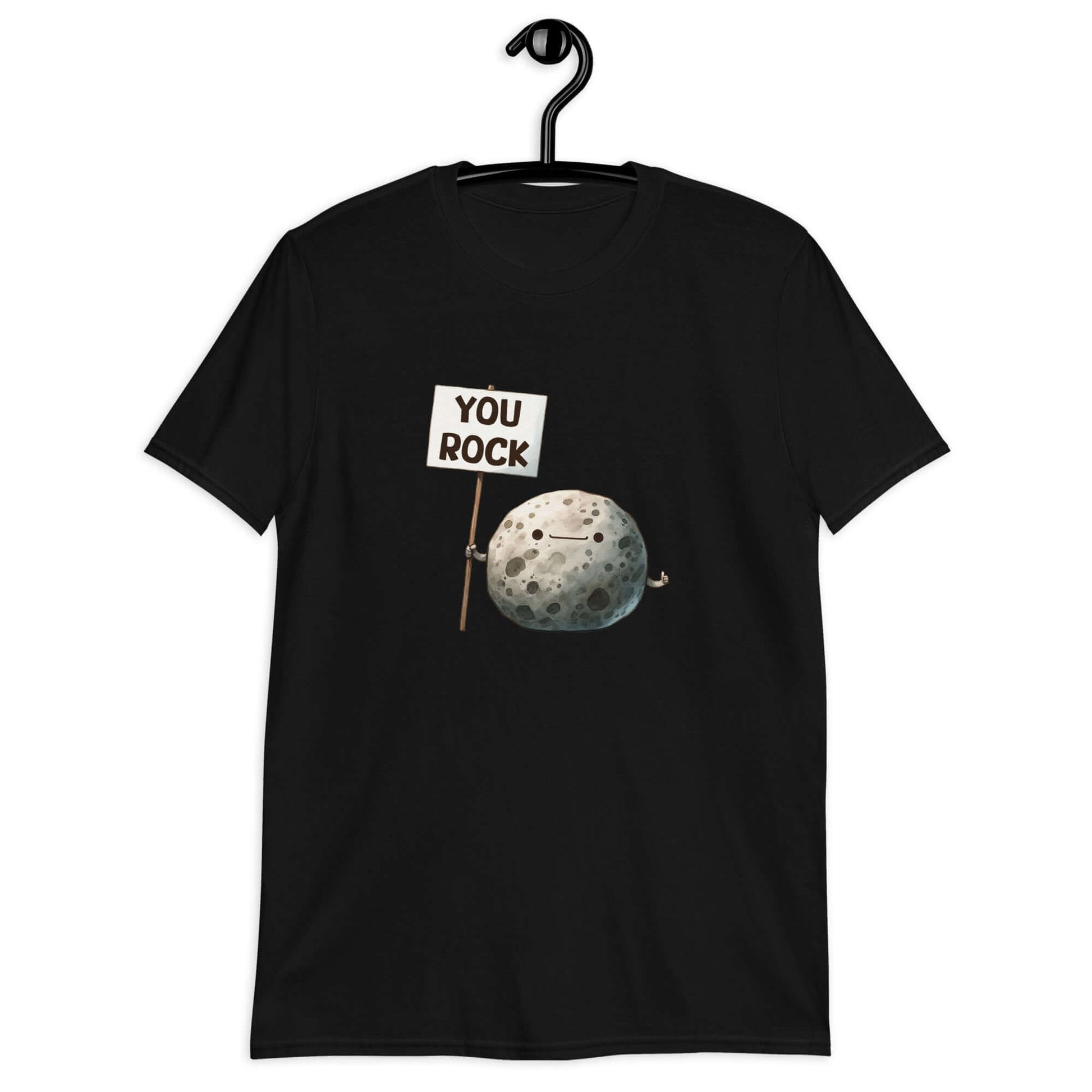 Black t-shirt that has an image of a grey rock that is holding a sign. The sign says You Rock. The image is printed on the front of the t-shirt..