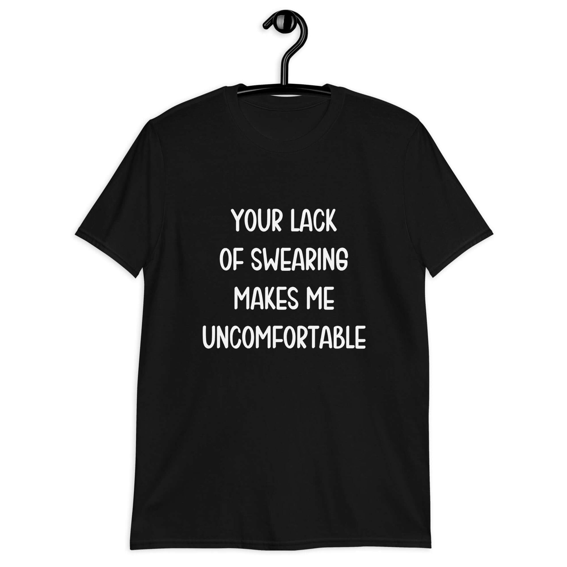 Black t-shirt with the phrase Your lack of swearing makes me uncomfortable printed on the front.