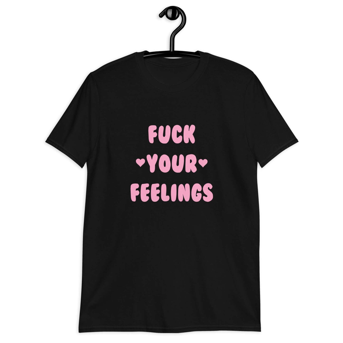 Black t-shirt with the words Fuck your feelings printed on the front in pink. There are cute pink hearts next to the words.