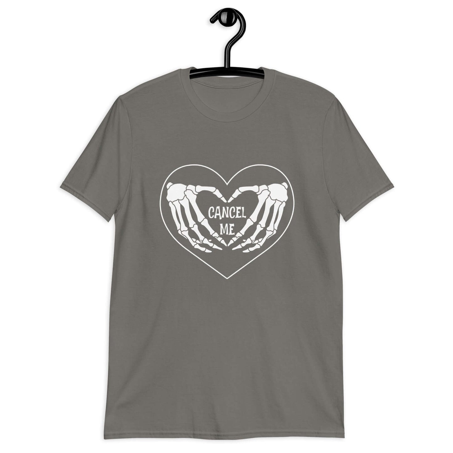 Charcoal grey t-shirt with a black heart and skeleton hands making a heart shape printed on the front. The words Cancel Me are inside of the heart.